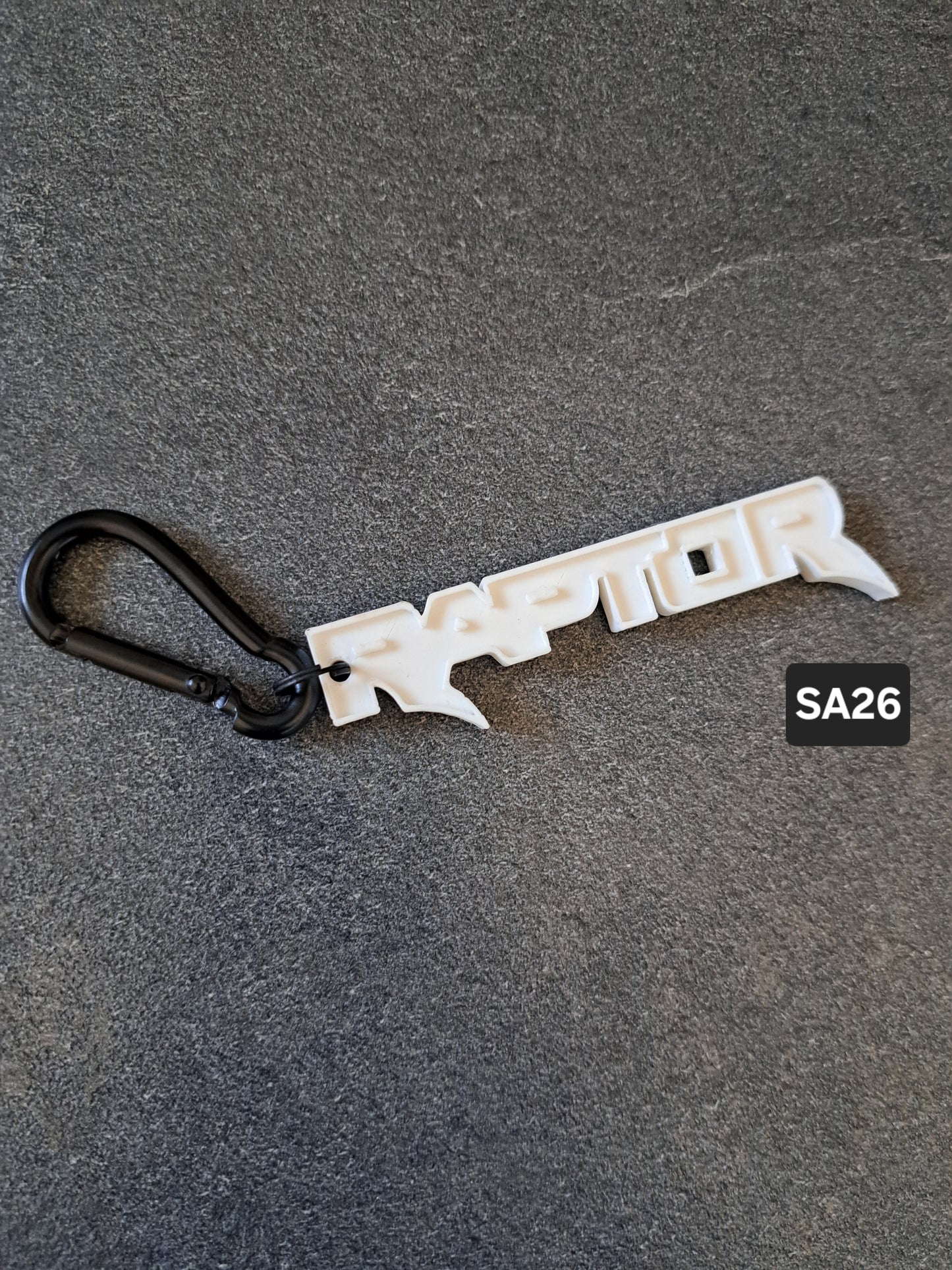 Schlüsselanhänger Schriftzug RAPTOR