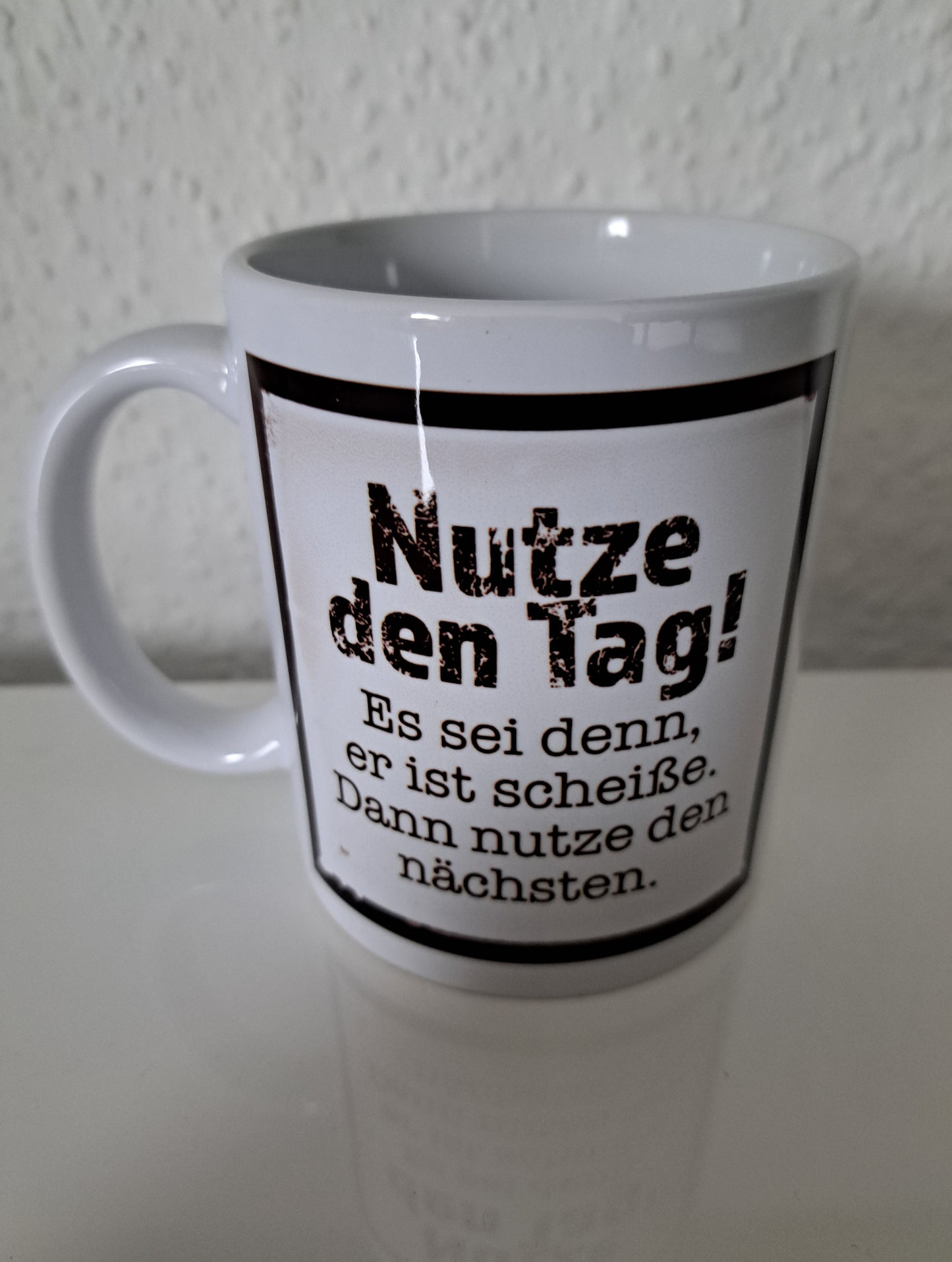 Kaffeetasse Nutze den Tag